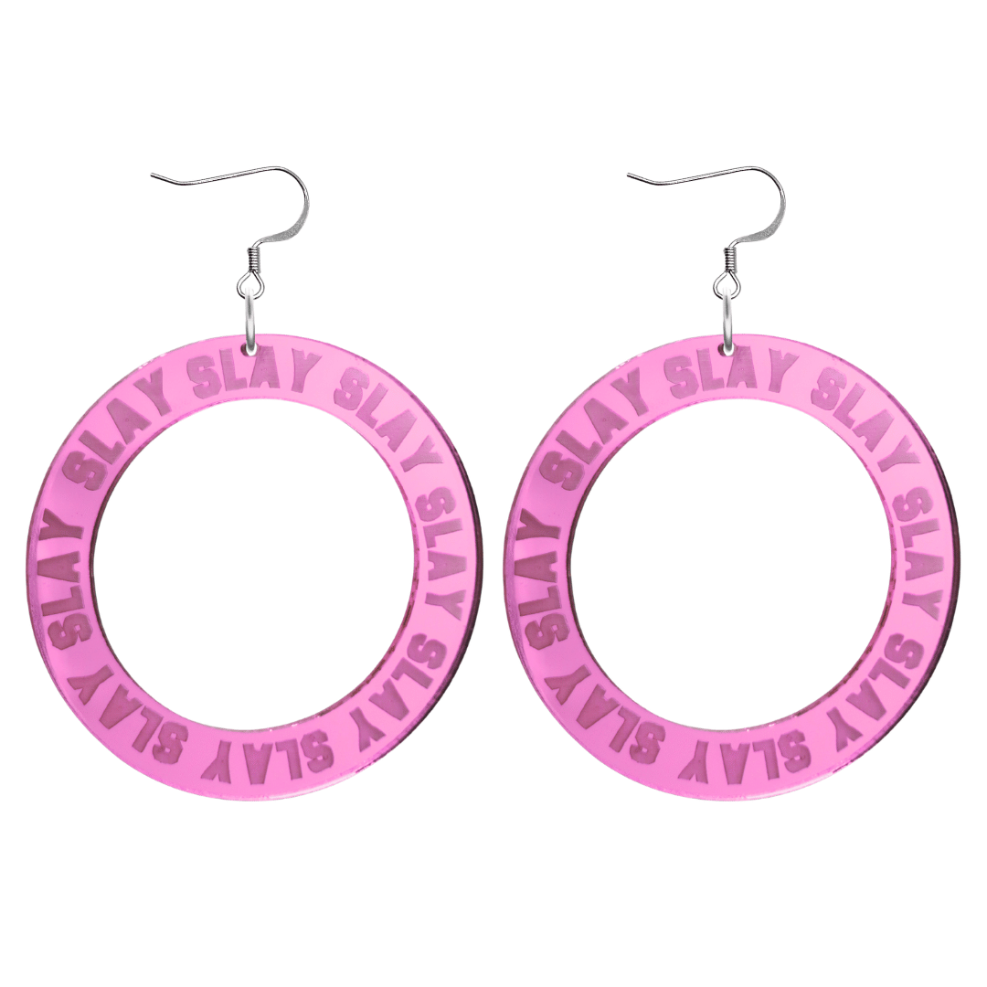 haus of dizzy mirror pink acrylic hoop earrings with repeated 'SLAY' etched text around the hoop size large with silver hooks no circle tops