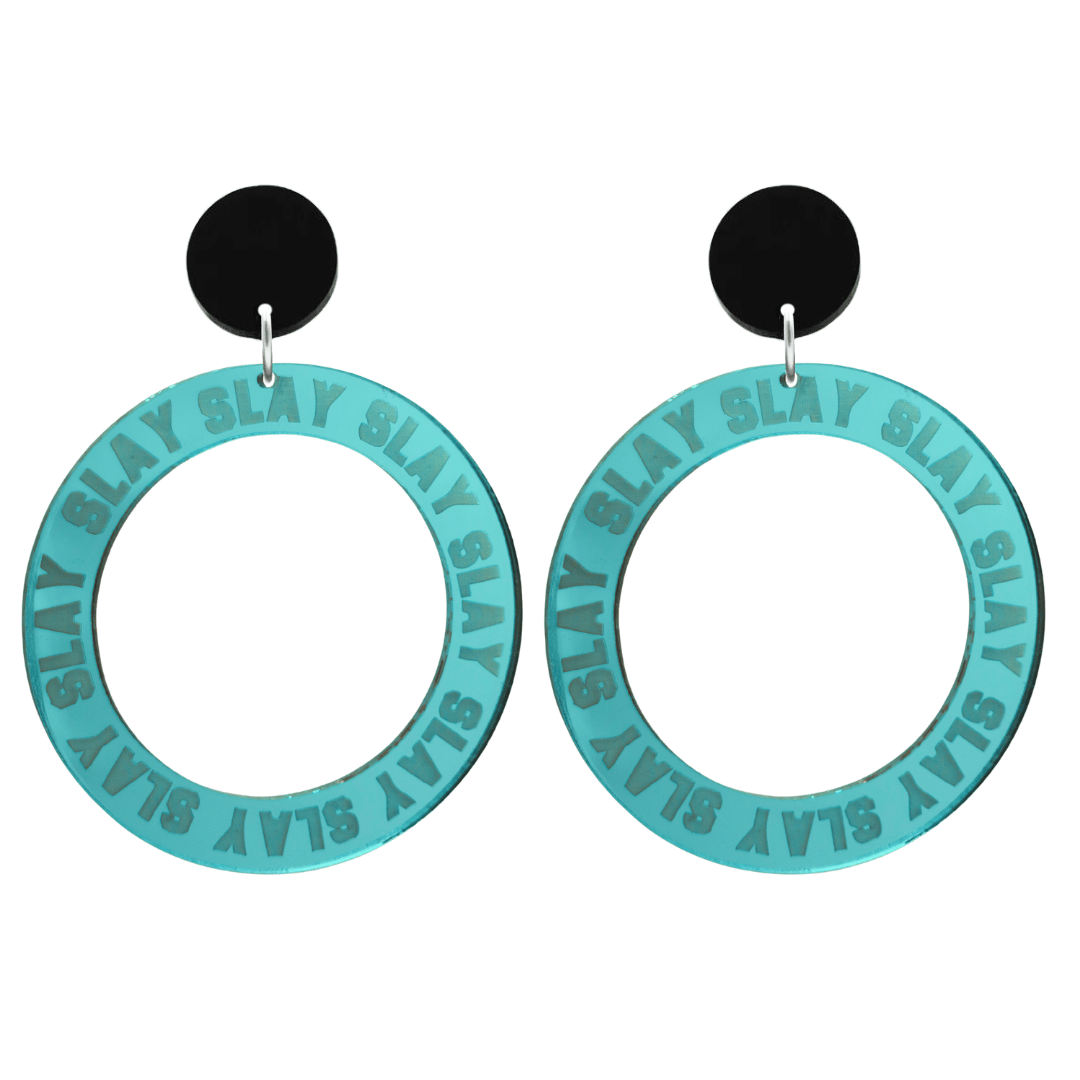 haus of dizzy mirror teal acrylic hoop earrings with repeated 'SLAY' etched text around the hoop size large with black circle tops