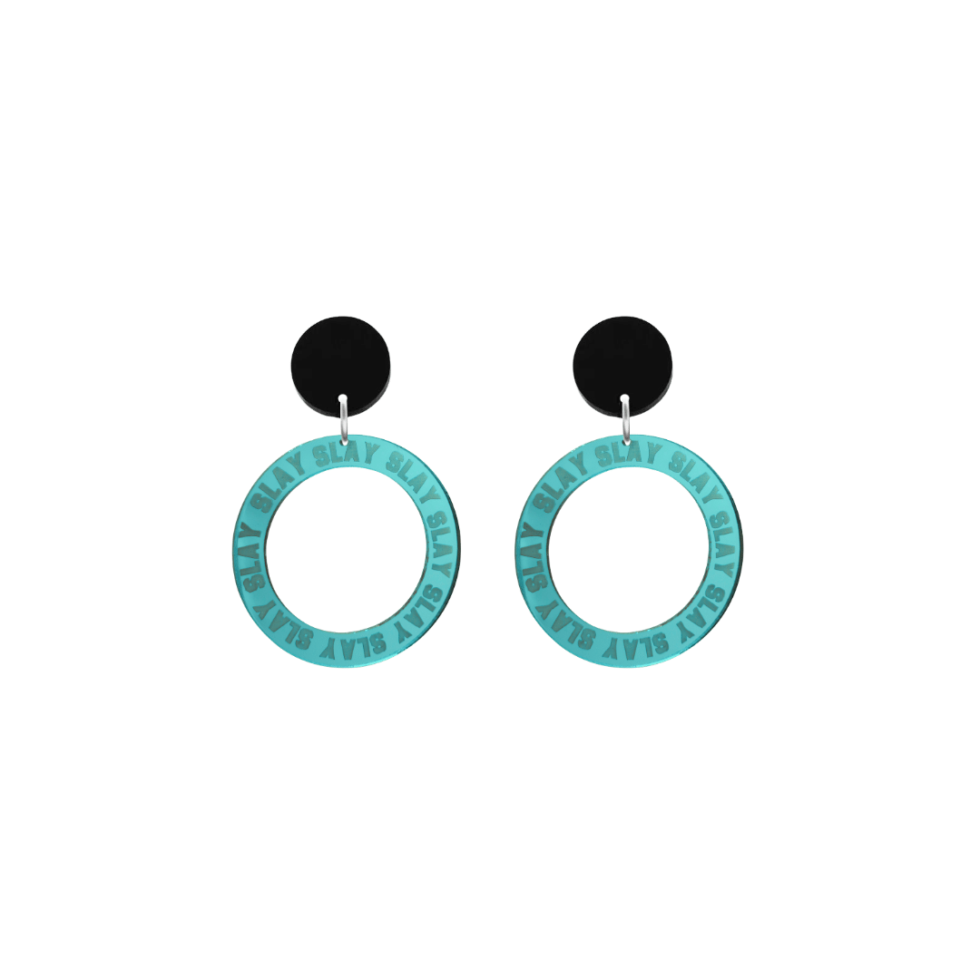 haus of dizzy mirror teal acrylic hoop earrings with repeated 'SLAY' etched text around the hoop size extra small with black circle tops