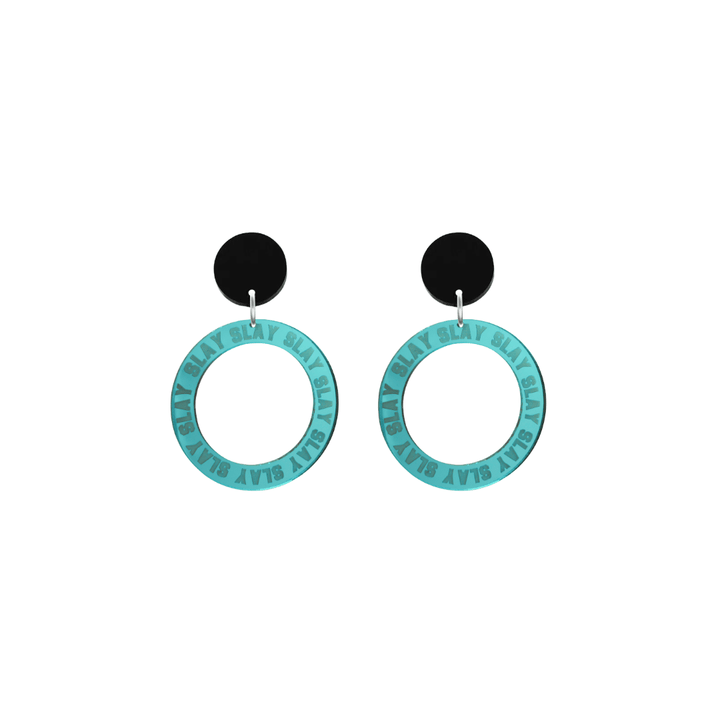 haus of dizzy mirror teal acrylic hoop earrings with repeated 'SLAY' etched text around the hoop size extra small with black circle tops