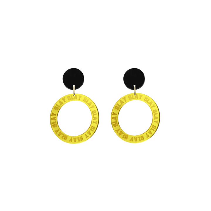 haus of dizzy mirror yellow acrylic hoop earrings with repeated 'SLAY' etched text around the hoop size extra small with black circle tops