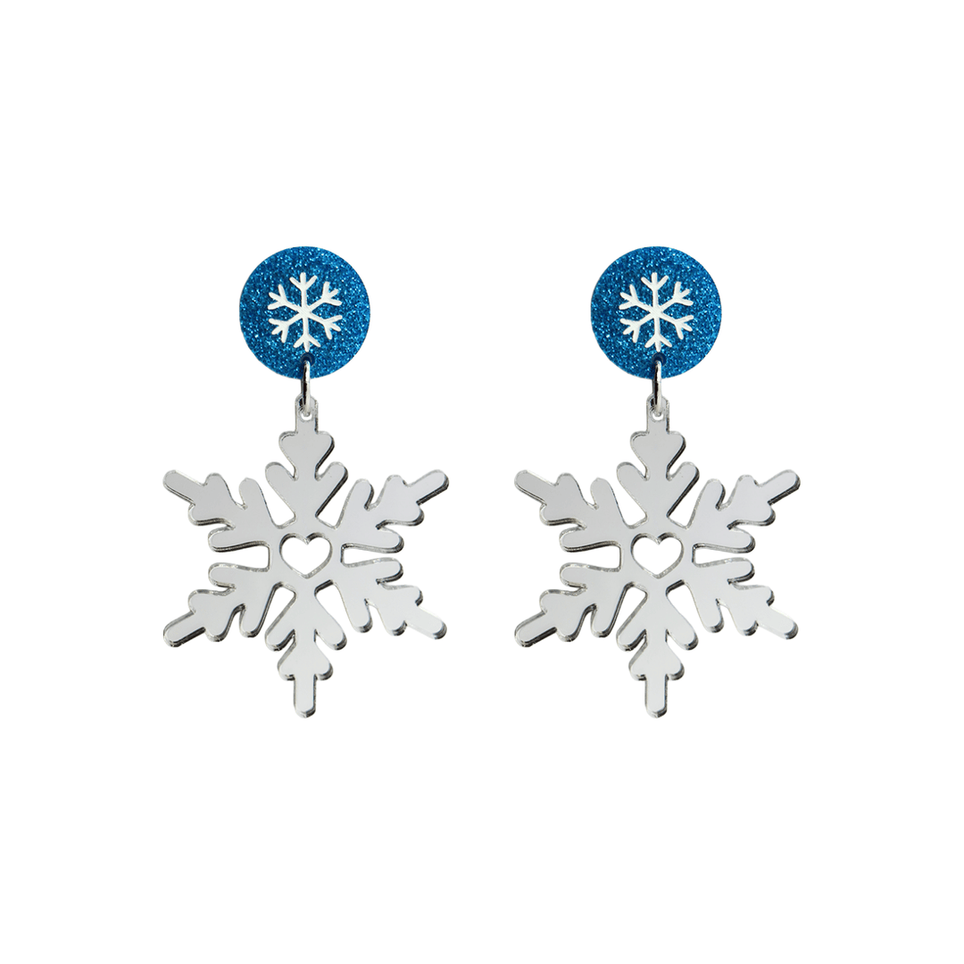 haus of dizzy silver mirror snowflake earrings with dark blue single side glitter circle tops with hand painted snowflake detailing size large