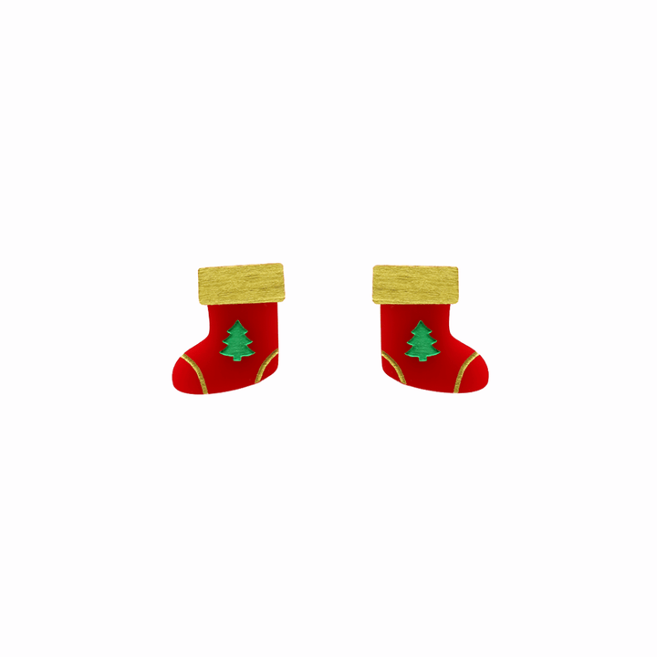 haus of dizzy stocking stuffers studs. red gloss Christmas stockings with green trees and gold detailing one size