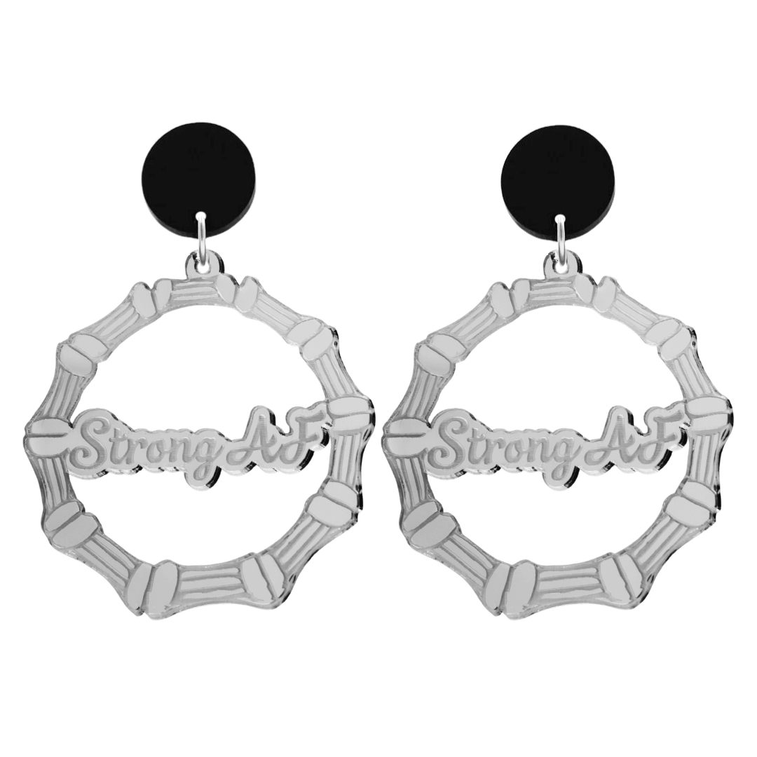 haus of dizzy acrylic silver mirror bamboo hoops with ollie cursive text that reads strong AF with black circle stud tops size large