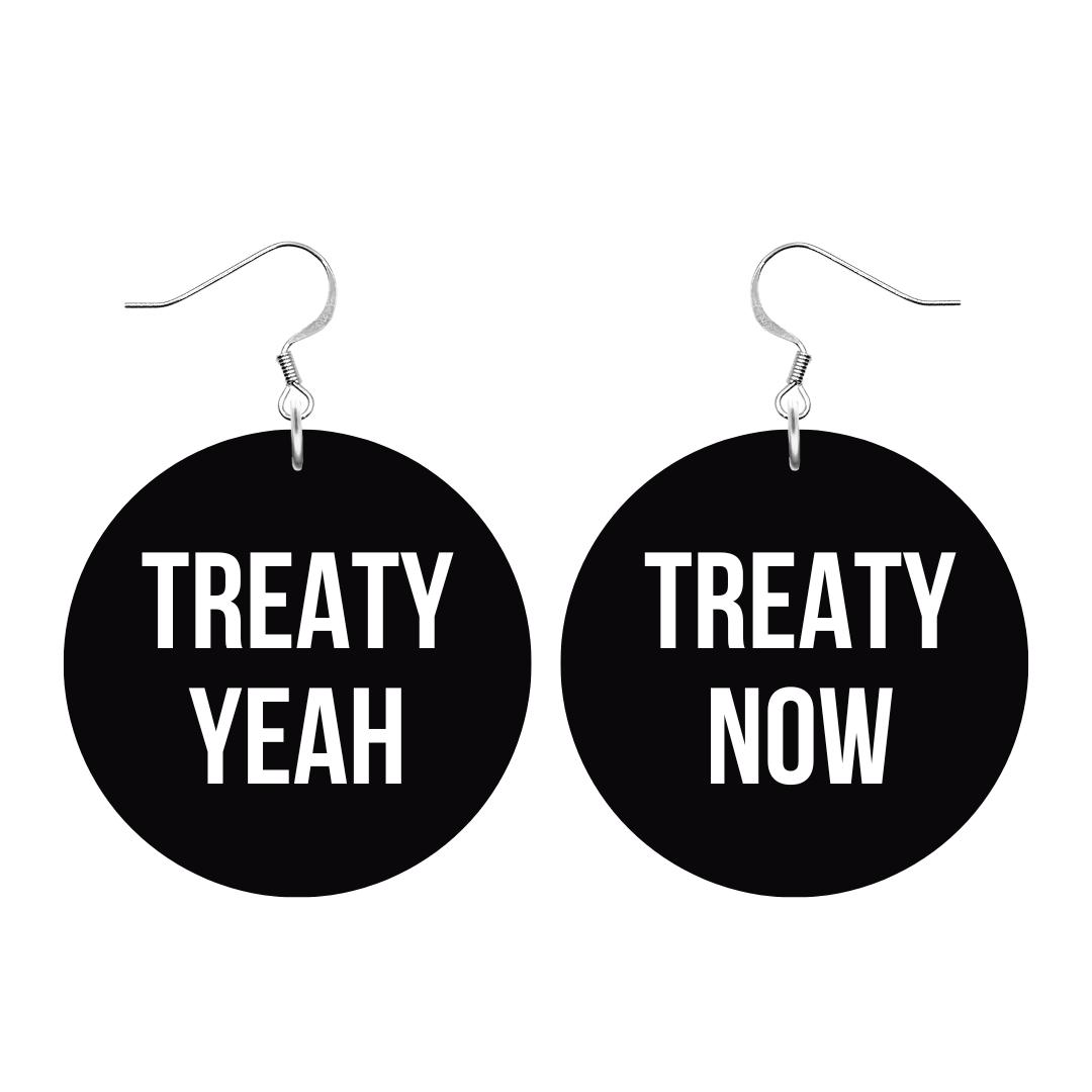 haus of dizzy treaty yeah treaty now earrings part of wear the resistance collection. black circle earrings with white text, one earring says treaty yeah the other treaty now. with silver hooks