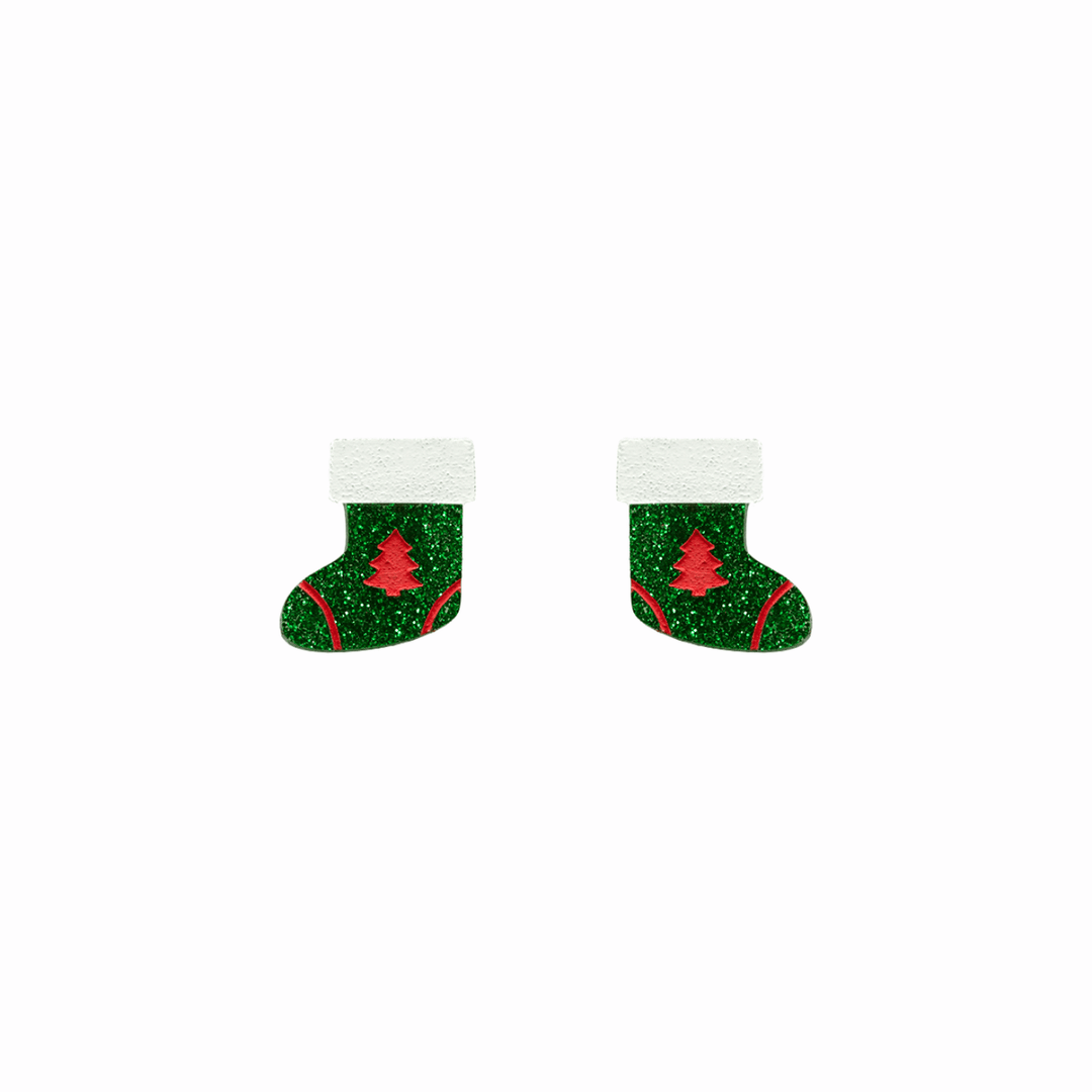 haus of dizzy twinkle toes studs. green glitter christmas stockings with red painted trees and white detailing. one size