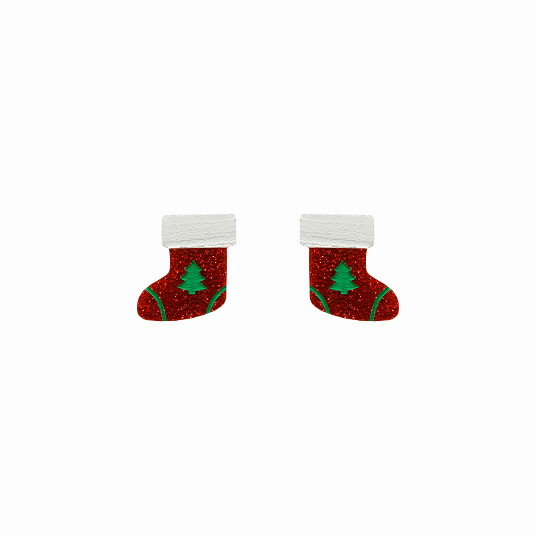haus of dizzy twinkle toes studs. red glitter christmas stockings with green painted trees and white detailing. one size