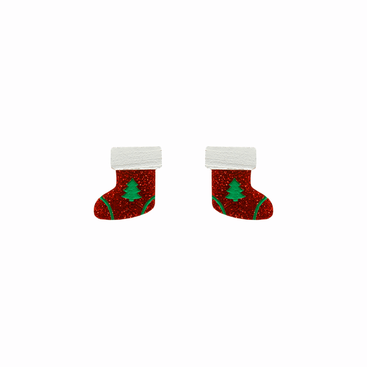 haus of dizzy twinkle toes studs. red glitter christmas stockings with green painted trees and white detailing. one size
