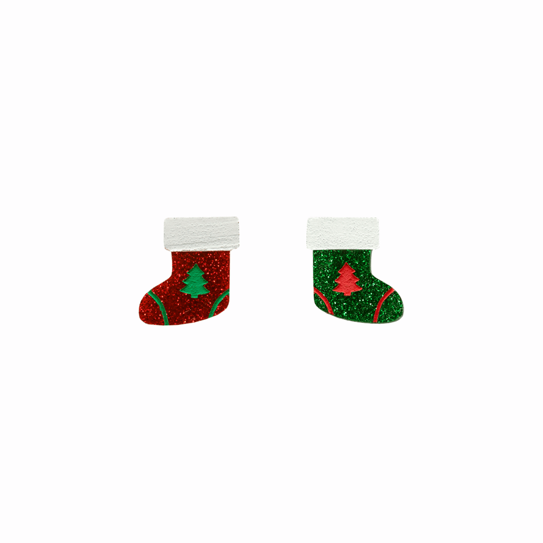 haus of dizzy twinkle toes studs. red and green glitter christmas stockings with green and red painted trees and white detailing. one size