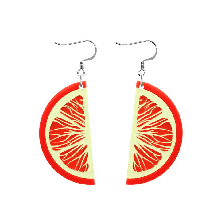 An image of Haus of Dizzy's Vitamin C earrings, large orange sliced-shaped dangle earrings, with orange acrylic with ivory paint fill and a hook top.